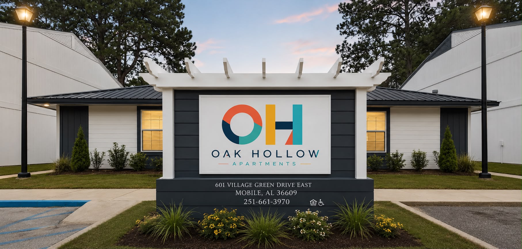 Oak Hollow Apartments monument sign at the community entrance in Mobile, AL